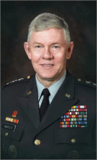 Image of a uniformed member, a past director of D-I-A