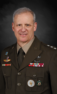 Image of a uniformed member, a past director of D-I-A