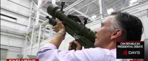 Image of CNN article with a man holding a launcher of sorts.